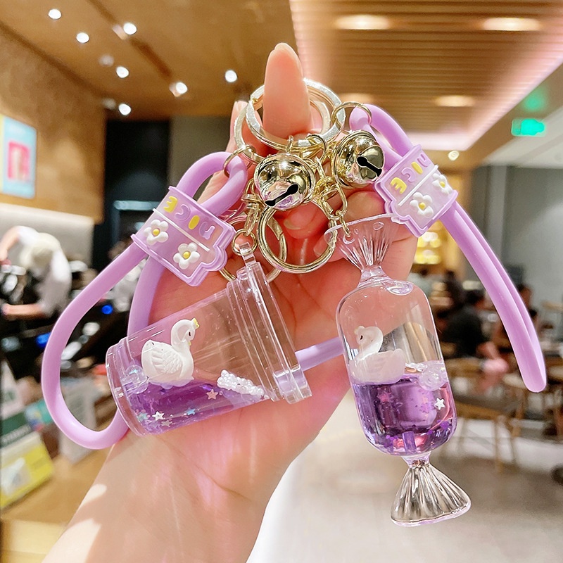 Móc Khóa Hình Thiên Nga Hoạt Hình Nổi Trên Nước Màu Tím Dễ Thương