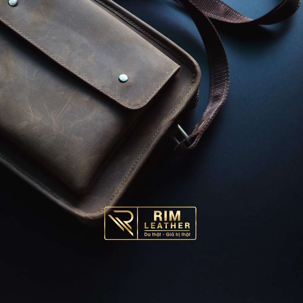 Túi đeo chéo dáng ngang. Bảo hành 2 năm