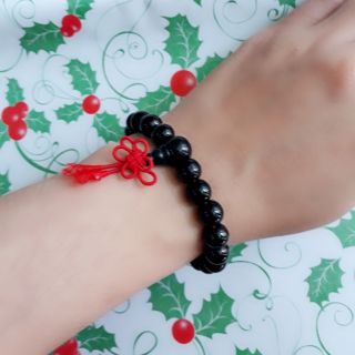 Vòng tay chuỗi đen thắt nút đồng tâm may mắn