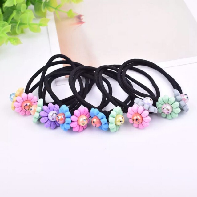 Sỉ 10 buộc tóc hoa mặt cười  37k