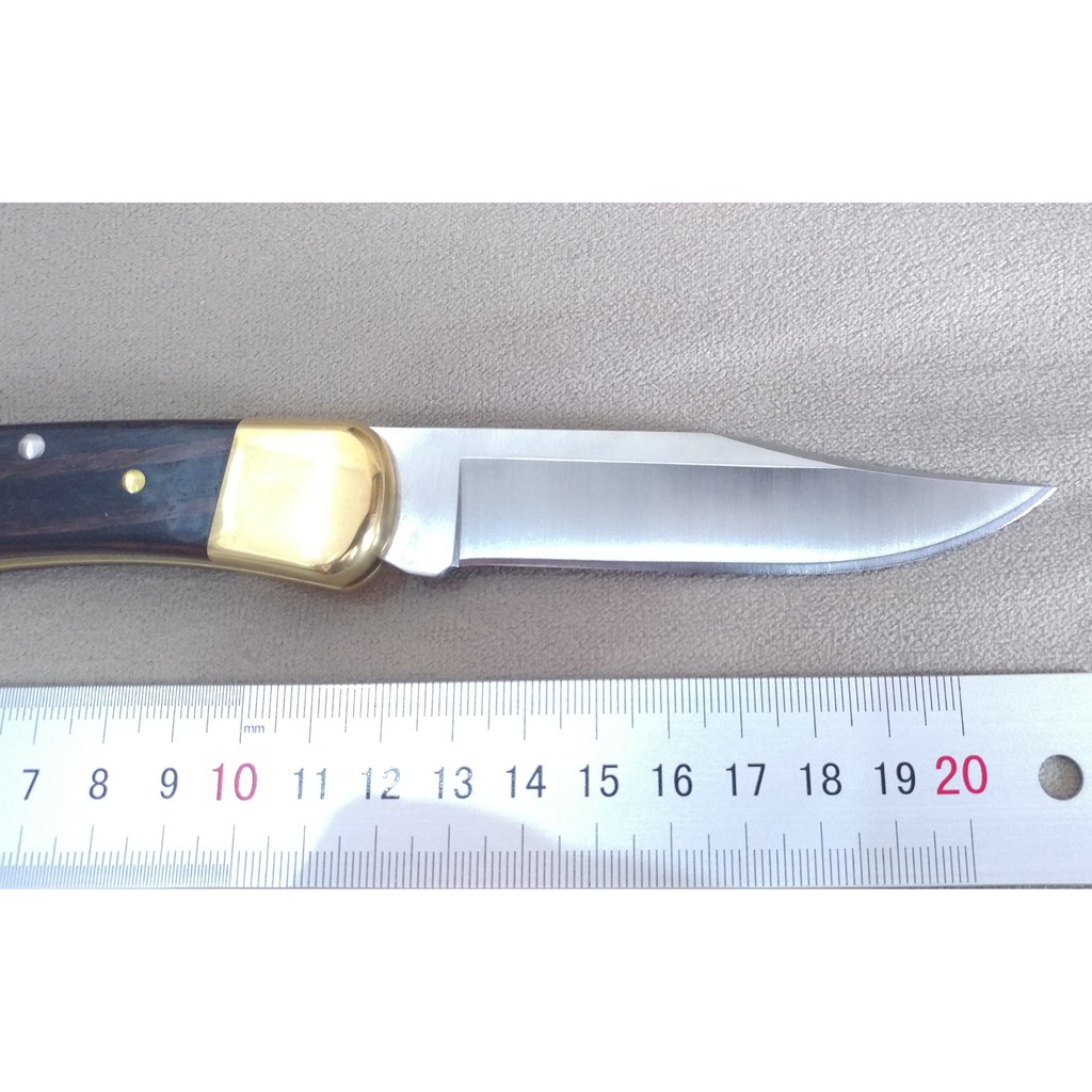 Dao gấp bỏ túi Buck 110 kèm bao da, phù hợp mang theo hàng ngày