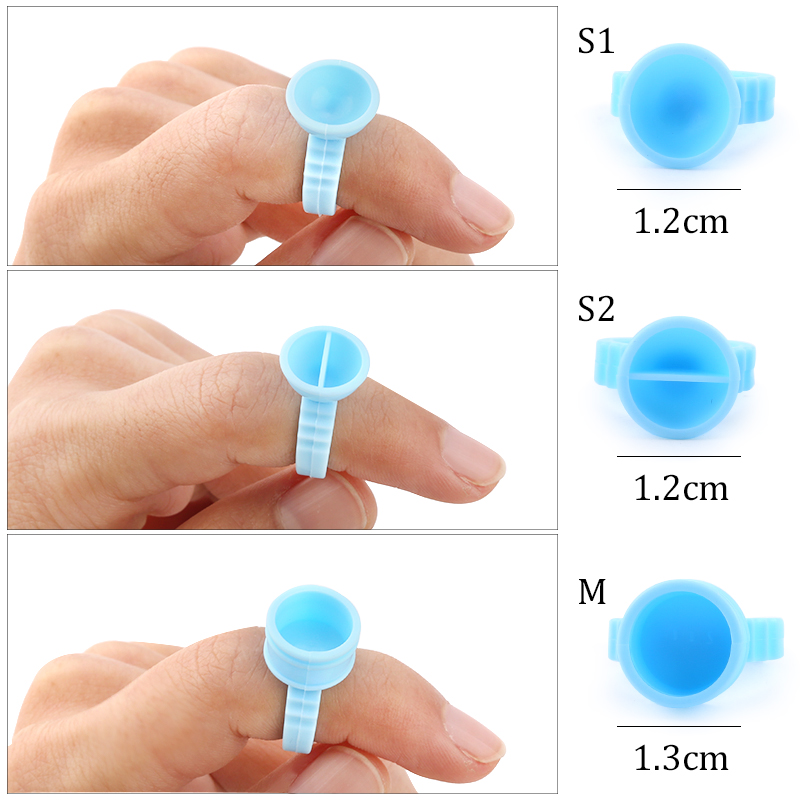 50 trên 100 chiếc vòng đeo tay mở rộng lông mi một lần, một công cụ mở rộng: Ai đó giữ người đàn ông bằng hộp xăm