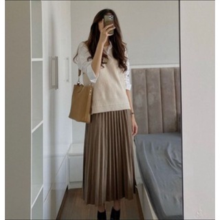 Chân váy nhung và áo ghi lê len hàng đếm 120 sale 52k