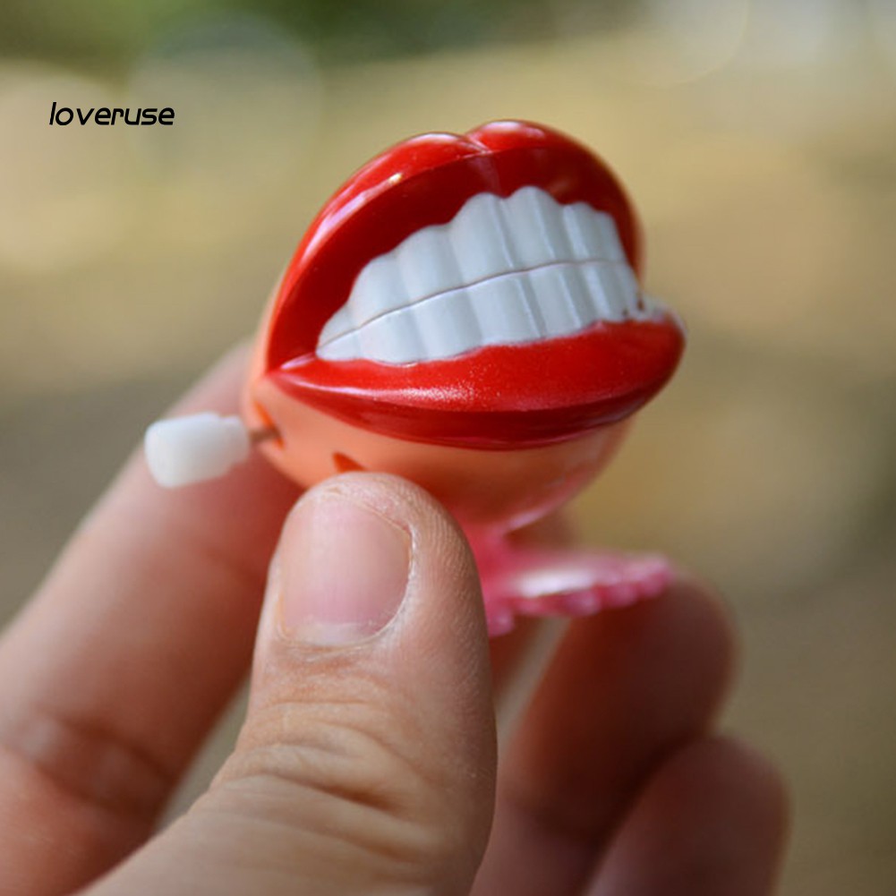 Đồ chơi lên dây cót hình hàm răng hoạt hình vui nhộn cho bé