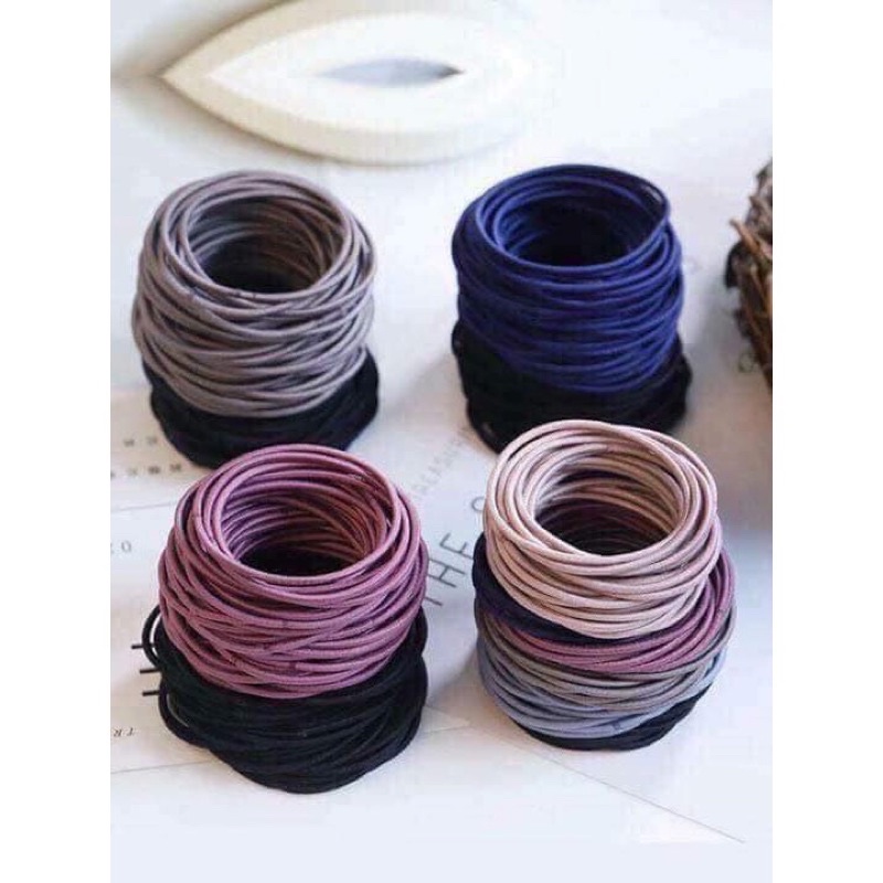 Sét 100 dây buộc tóc có túi zip đựng