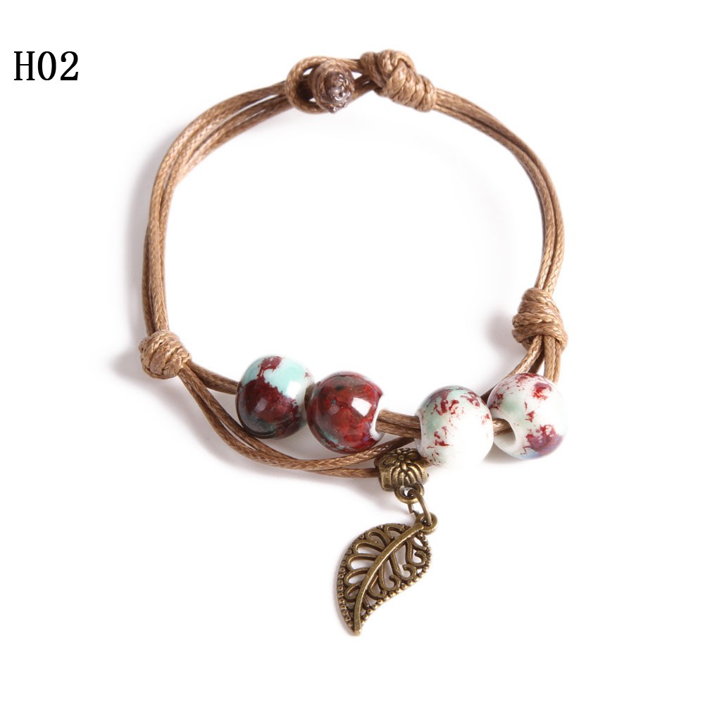 Vòng tay dây da 4 hạt sứ nhiều màu | BigBuy360 - bigbuy360.vn