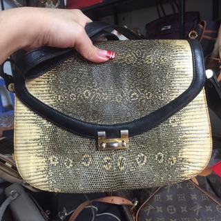 Túi xách da kỳ Đà