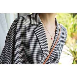 Jumpsuit kẻ đùi dáng cổ vest