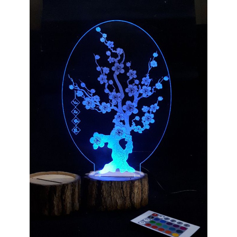 Đèn led cây Mai đế gỗ vỏ tròn.