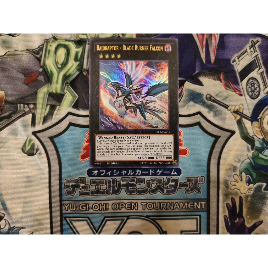 Thẻ bài Yugioh chính hãng Raidraptor - Blade Burner Falcon - DRL3-EN005 - Ultra Rare 1st Edition