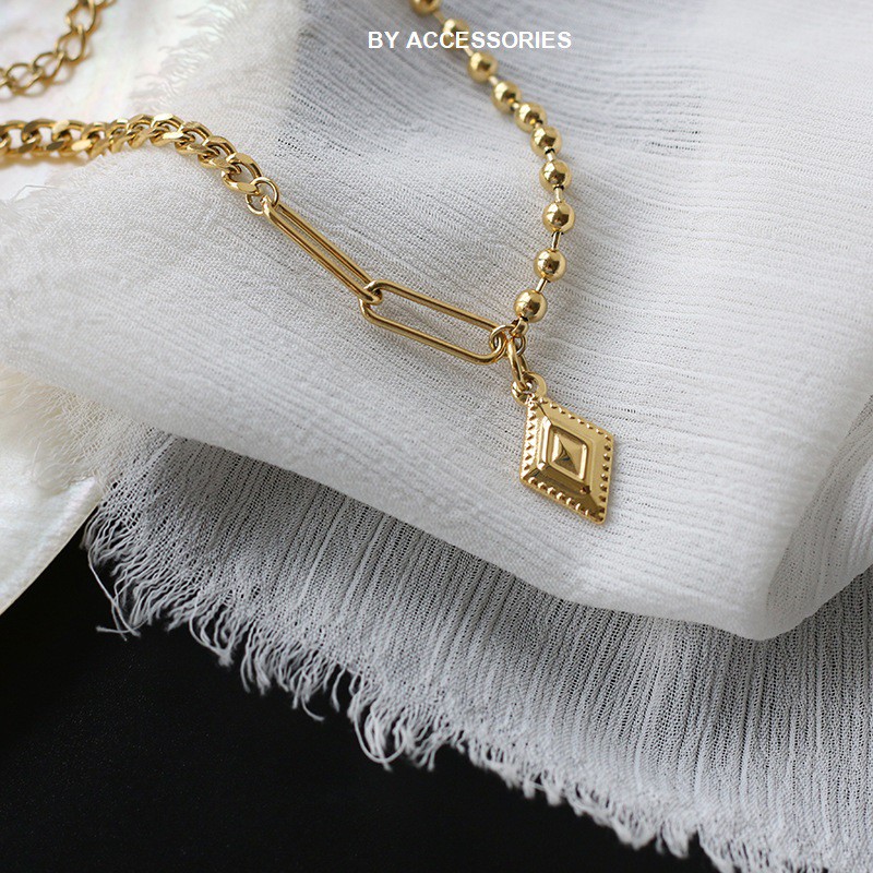 Lắc tay titan xích và bi tròn phối mặt hình thoi không gỉ