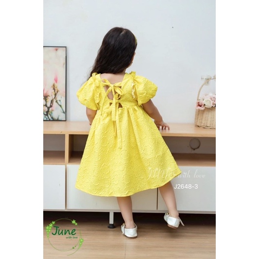 Đầm gấm vàng hoa nổi bé gái 1-10Y