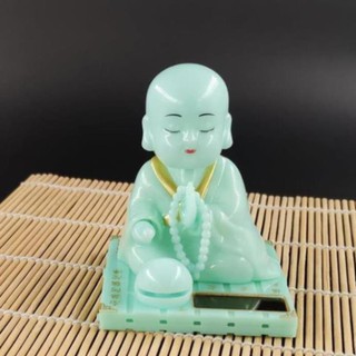 Tượng Phật gõ mỏ tụng kinh bằng ngọc