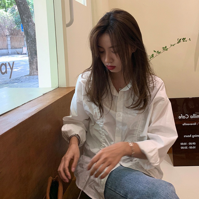 Áo sơ mi IELGY dài tay màu trắng phối dây rút xếp chồng thời trang Hàn Quốc cho nữ