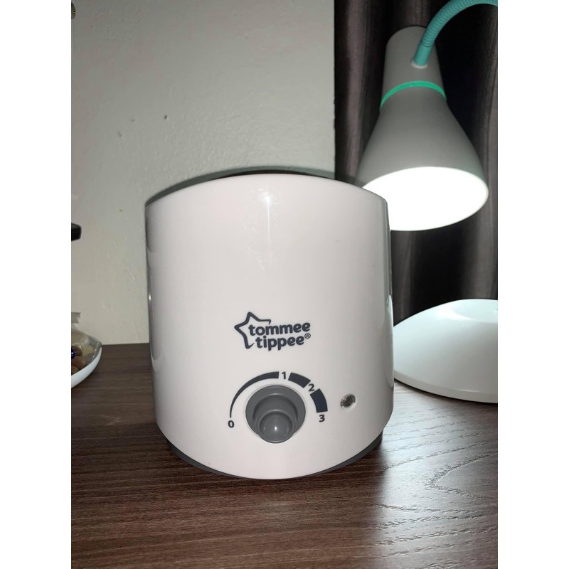 Pass máy hâm sữa tommee tippee 97%