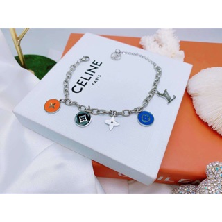 Lắc tay titan Lv trắng -ko rỉ