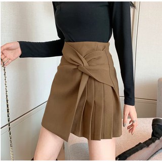 Chân váy xoắn eo giấu bụng