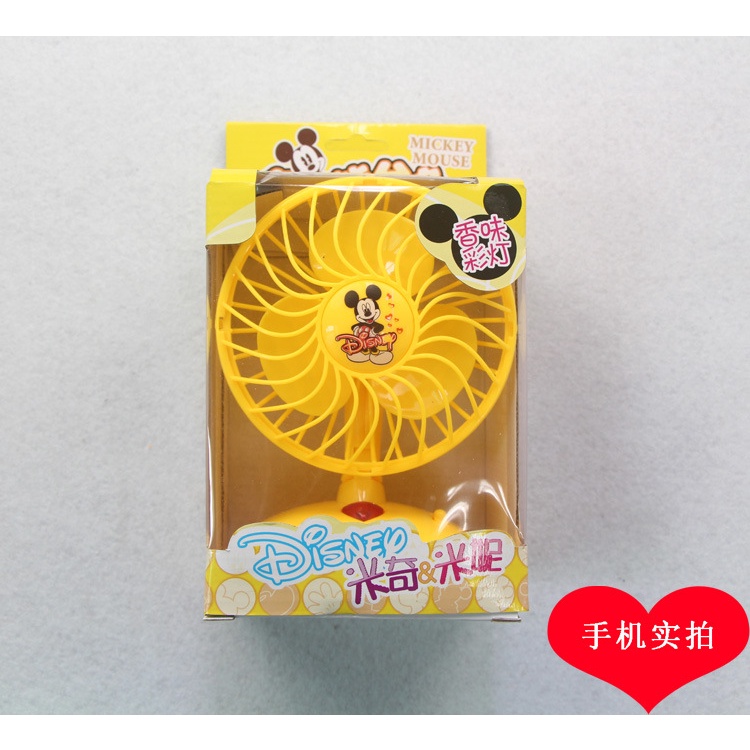 quạt cầm tay mini chạy pin tiện lợi.