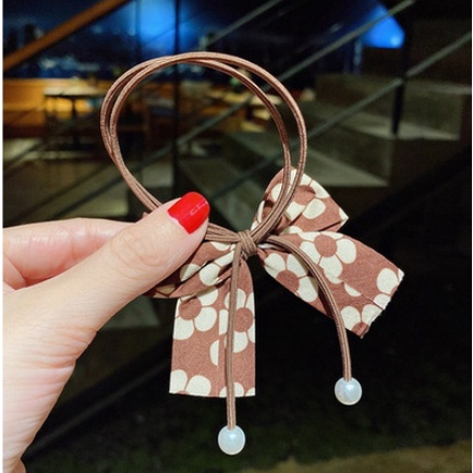 Thun cột tóc nơ bướm