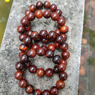 Vòng gỗ sưa hạt tròn 16 m m