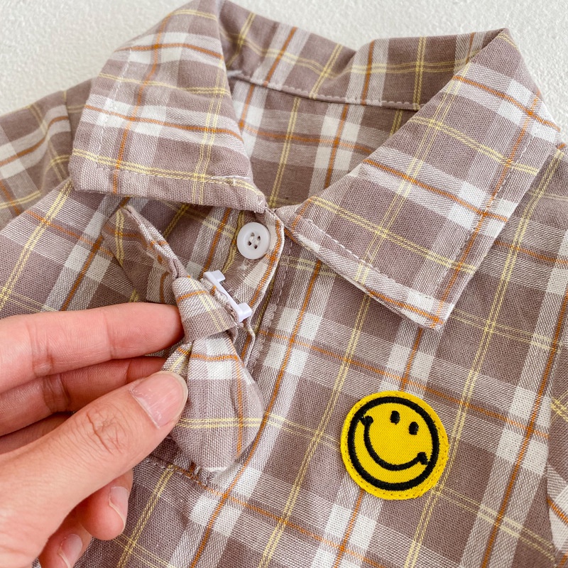 Bộ Áo Liền Quần Dài Tay Giả Vest Có Nơ Mặt Cười Cho Bé Trai