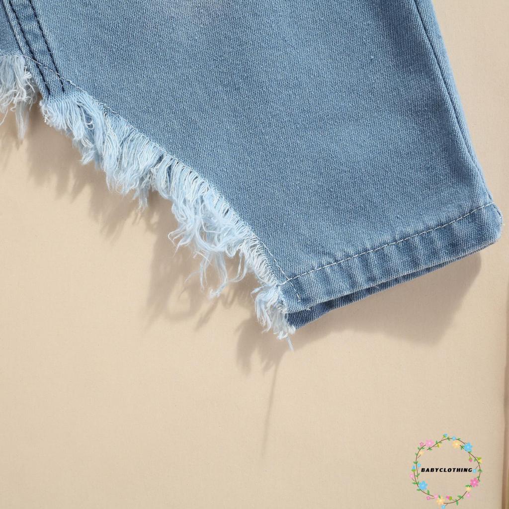 Set áo kiểu croptop denim tay ngắn hở một bên vai và chân váy denim vạt lệch màu sắc thời trang dành cho bé gái