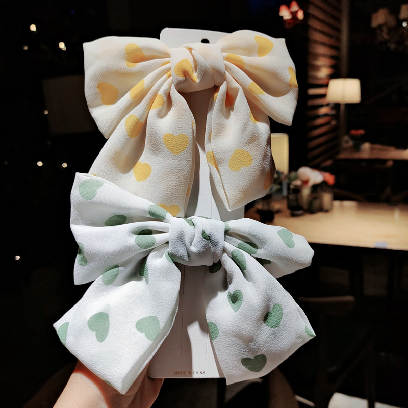 Kẹp tóc hình dáng nơ bằng vải chiffon họa tiết trái tim thời trang Hàn Quốc dễ thương cho nữ