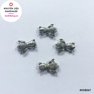 Bịch 9 cái/10gr - Mặt xi trắng hình cá ba đuôi xỏ ngang - HXB047