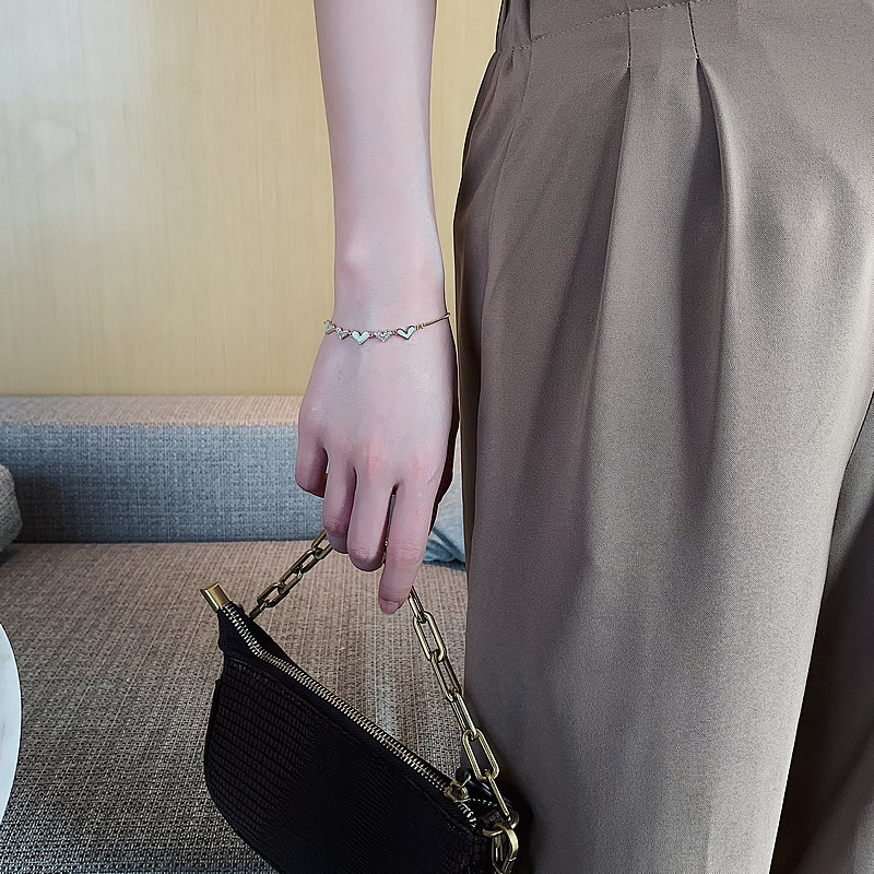 Vòng Tay Hợp Kim Mạ Vàng Hình Trái Tim Xinh Xắn Cho Nữ