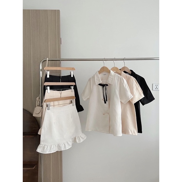 Set bộ đồ nữ Hàn Quốc chất liệu dạ text gồm áo cộc tay thắt nơ kèm chân váy ngắn đuôi cá siêu tiểu thư (TTA142)