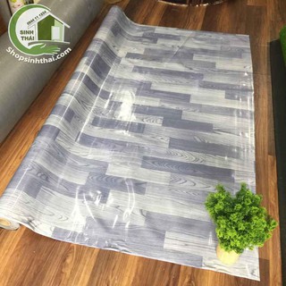 Thảm nhựa PVC simili trải sàn vân gỗ màu xám bóng