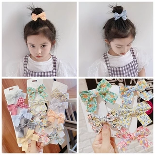 Kẹp tóc đính nơ họa tiết nhiều màu phối kim loại an toàn dành cho bé