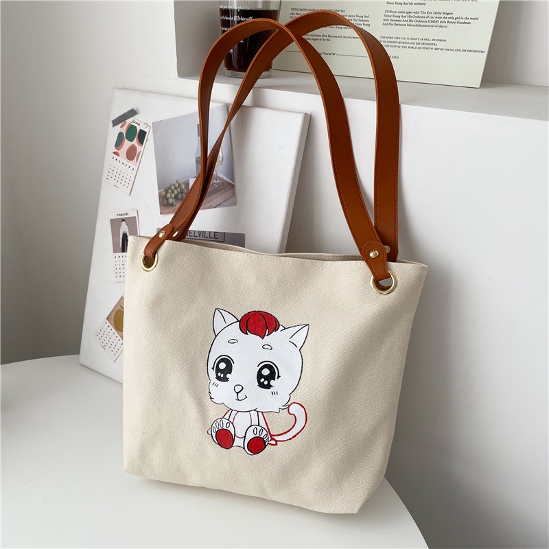 Túi đeo vai vải canvas sức chứa lớn họa tiết hoạt hình thời trang Hàn Quốc 2021