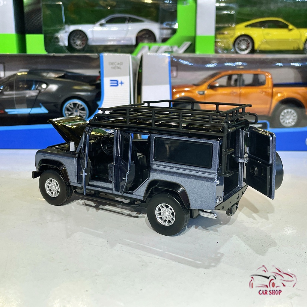 Mô hình xe Land Rover Defender tỉ lệ 1:32 hãng JACKIEKIM màu xám xanh