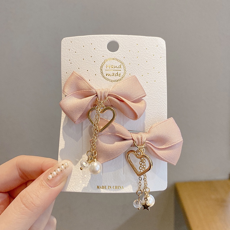 ✨✨Set 2 Kẹp Tóc Nơ Tua Rua Đính Ngọc Trai Giả Mừng Năm Mới