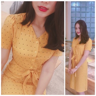 Đầm bi vàng thắt nơ eo