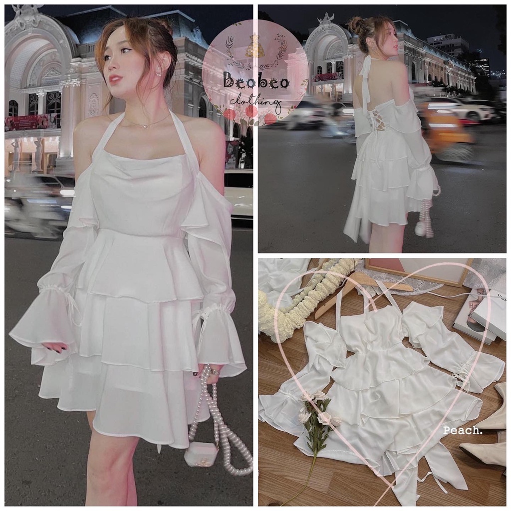 Đầm trắng cổ yếm rớt vai đan dây hở lưng xoè tầng vintage