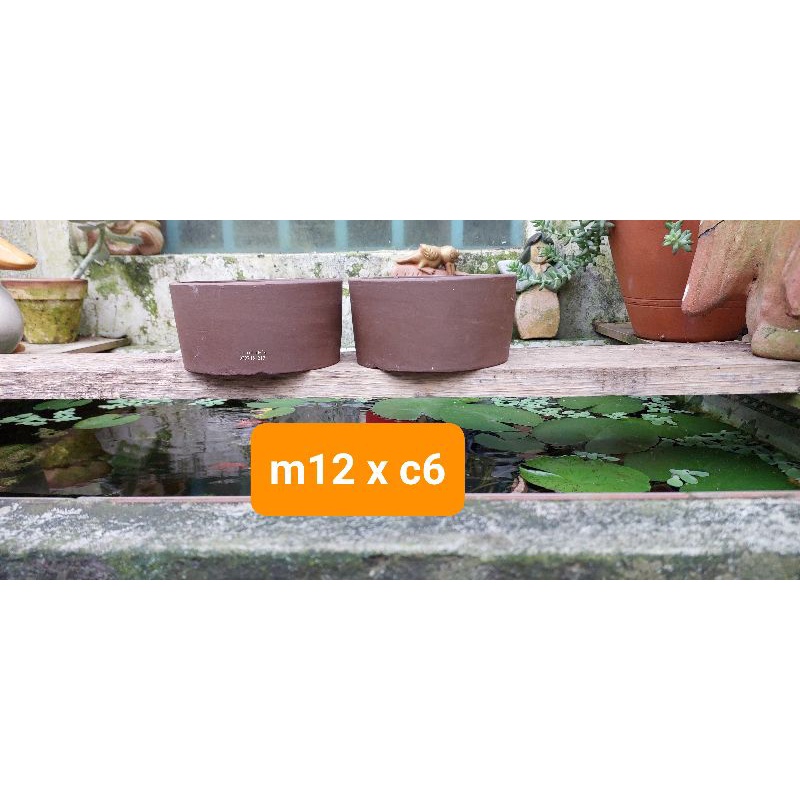 Chậu đất nung - chậu trụ tròn thấp đen miệng 12, cao 6