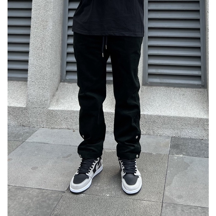 Quần nút bấm nhung tăm Amrish