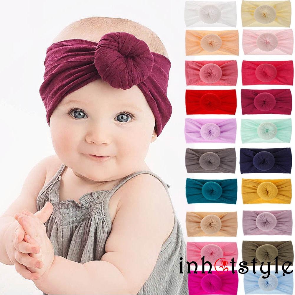 Băng đô búi củ tỏi dễ thương cho bé