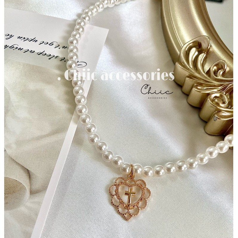 Dây chuyền vòng cổ nữ dạng chuỗi hạt mặt hình trái tim in chữ thập dáng tiểu thư V12 chiic accessori