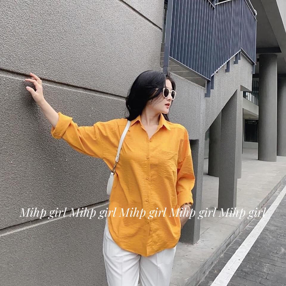 Áo sơ mi trơn nữ dài tay from rộng chất vải đũi Free size từ 45kg đến 65kg.