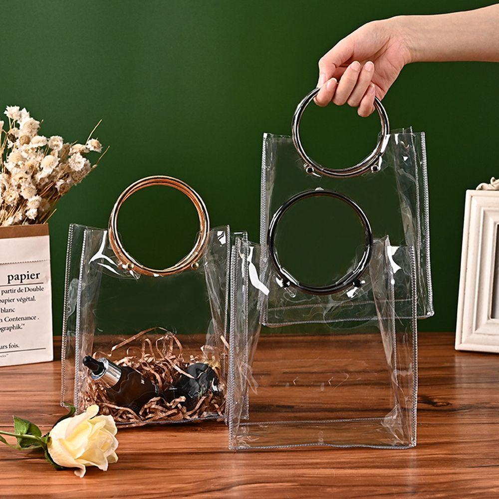 Túi Đựng Hộp Cơm Trưa Bằng PVC Trong Suốt Hình Tròn Viền Kim Loại Tiện Dụng
