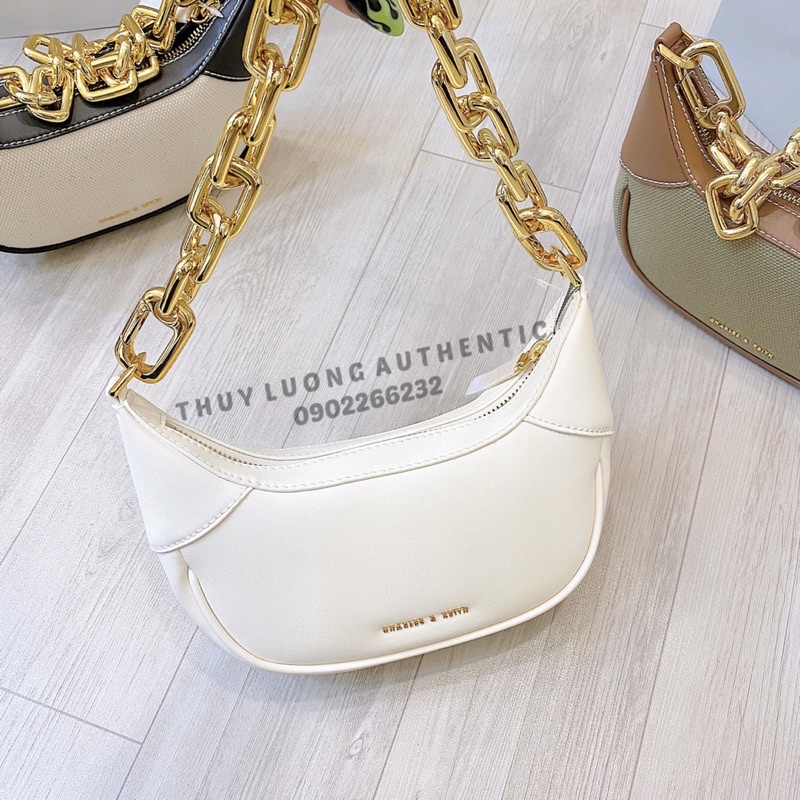 Túi xách Charles and Keith màu xanh lá, kem, kem đen