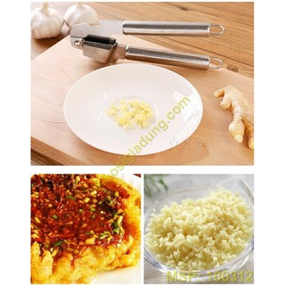 Dụng cụ ép tỏi cầm tay