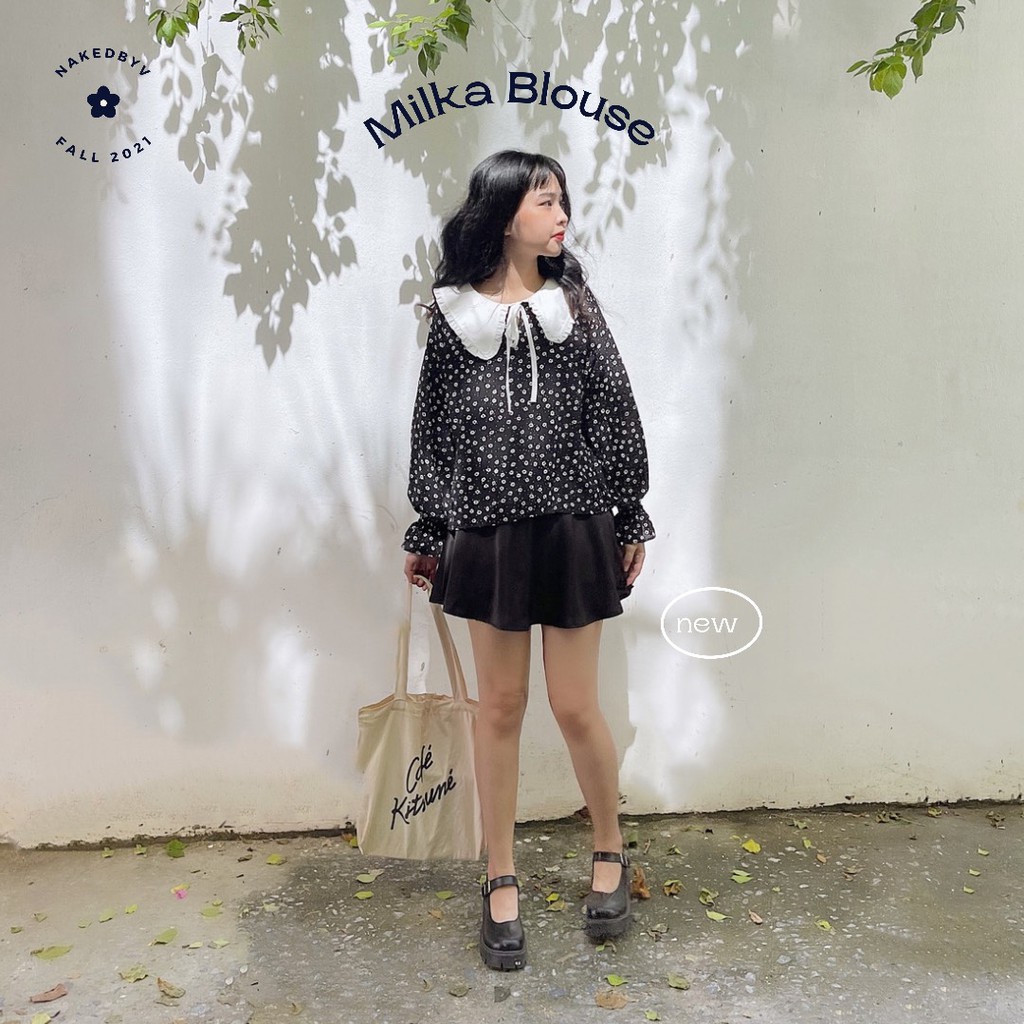 Naked By V - Áo cổ bèo buộc nơ Milka Blouse