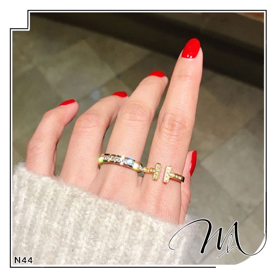 Nhẫn nữ Titan freesize chữ T đính đá phối xà cừ - Măng’s House N44