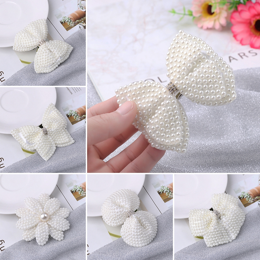 Kẹp tóc kiểu nơ đính ngọc trai giả dành cho bé gái