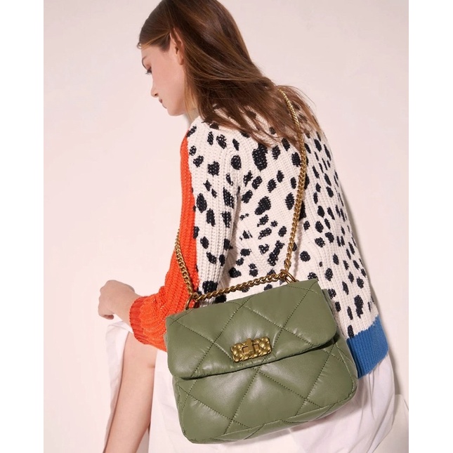 Túi ô trần khoá xoay chất da mới