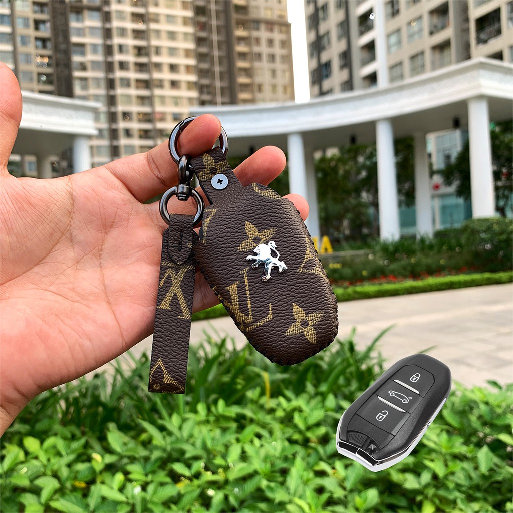 Đựng smartkey Peugeot 2008 3008 5008 Handmade da thật PEV AD có tay cầm